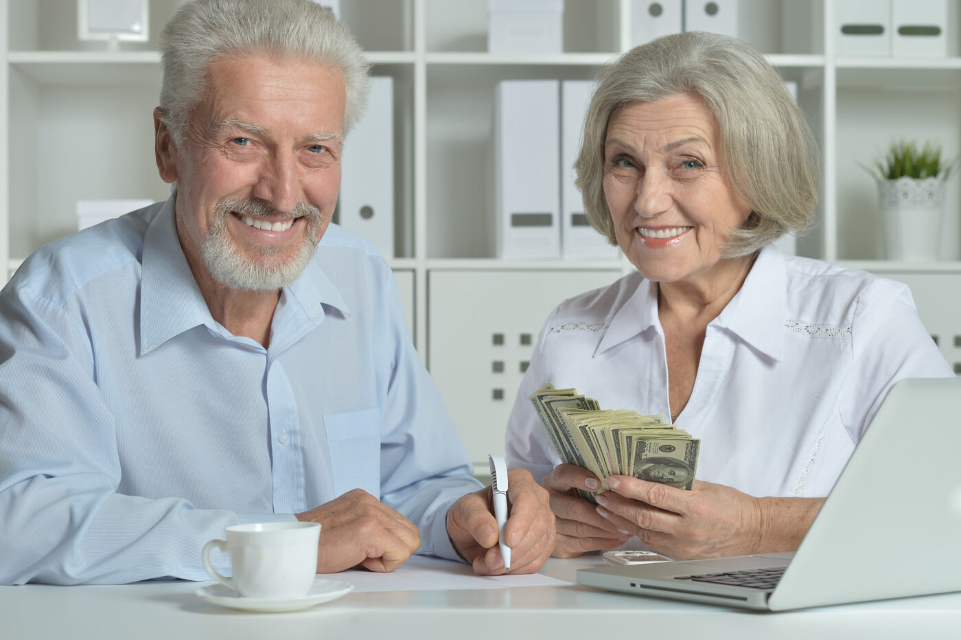 Happy couple with money